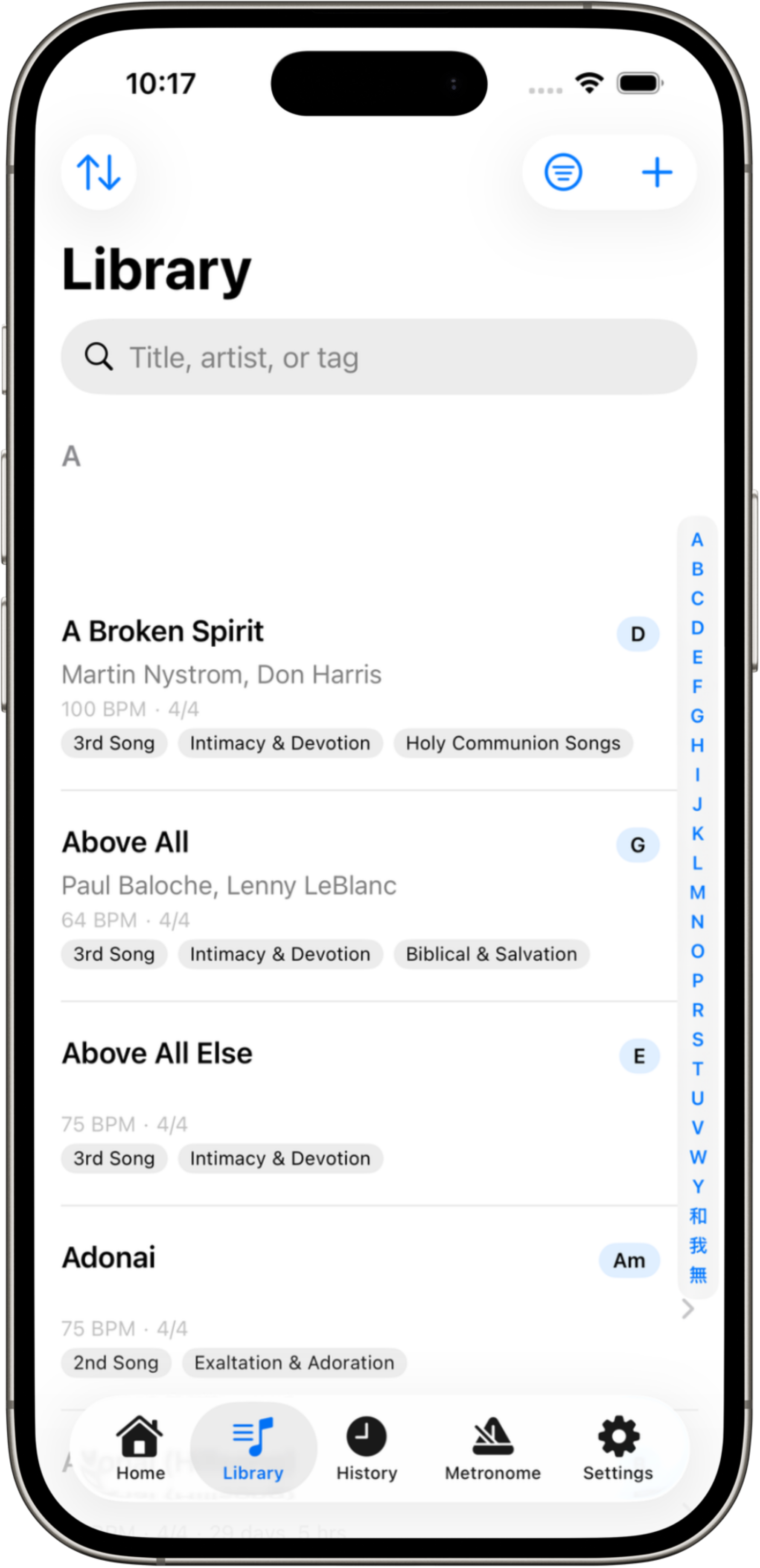Beacon song library showing alphabetical list with BPM, key, and tag filters